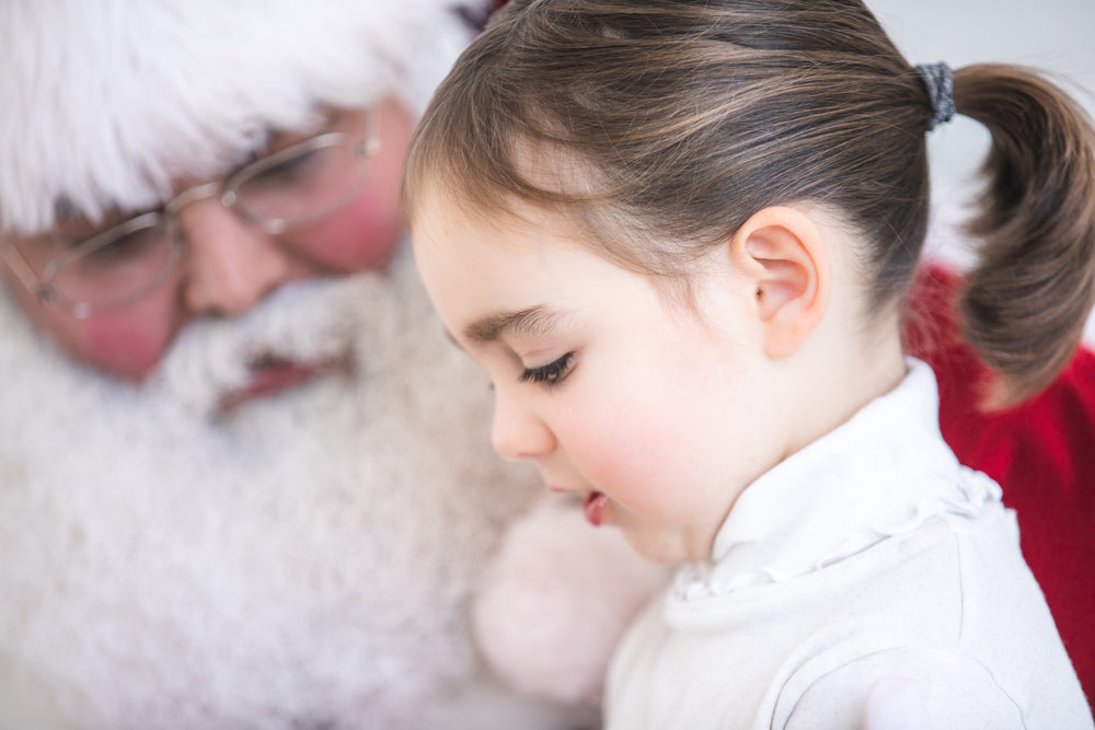 little girl with santa