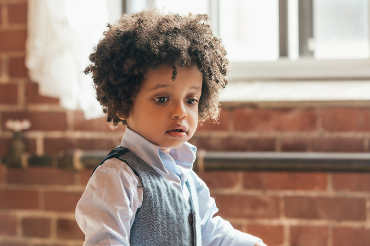 Little Young Boy With Great Hair