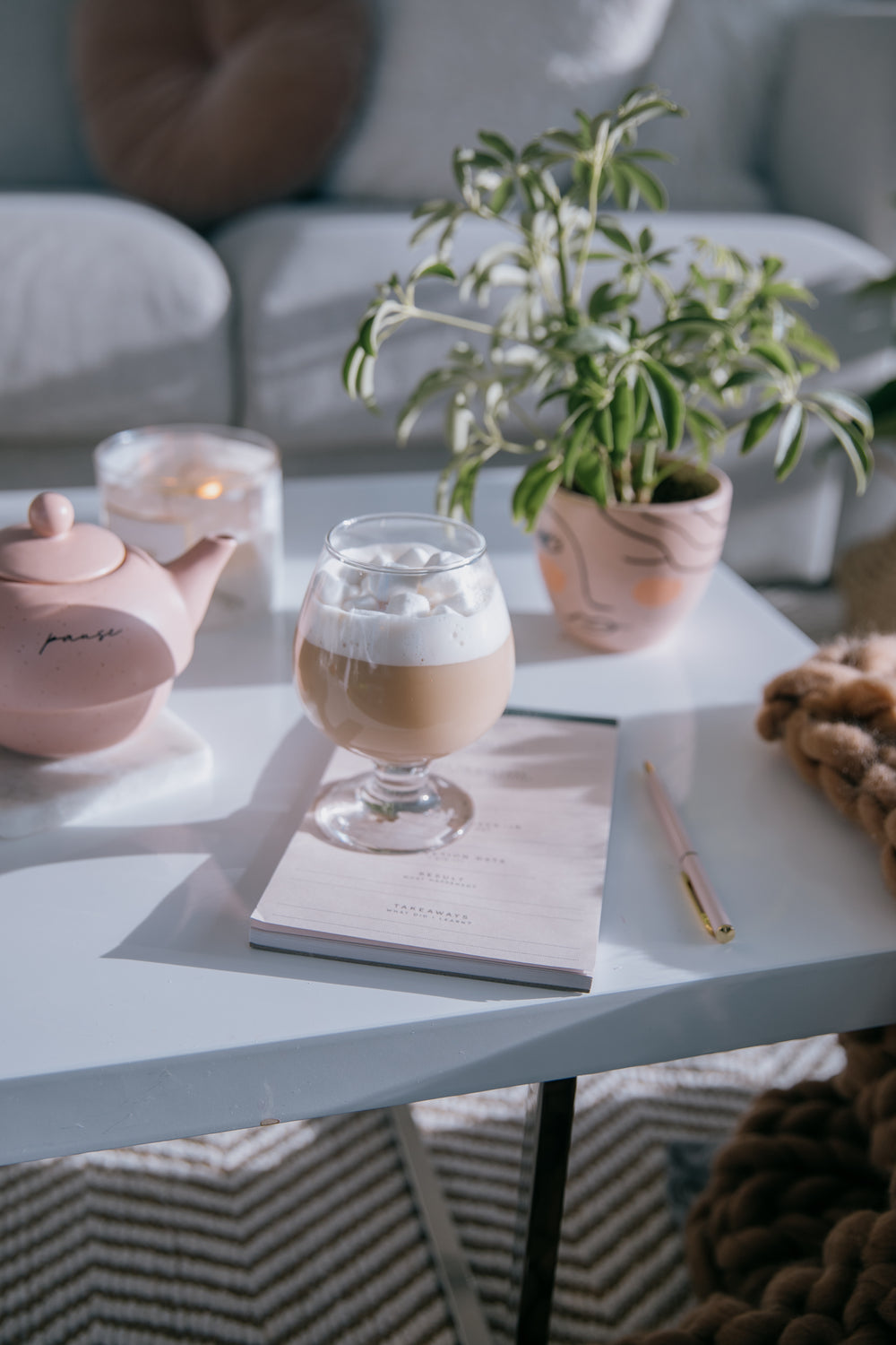 living room with coffee table with hot chocolate