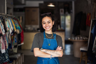 local store owner stands proud