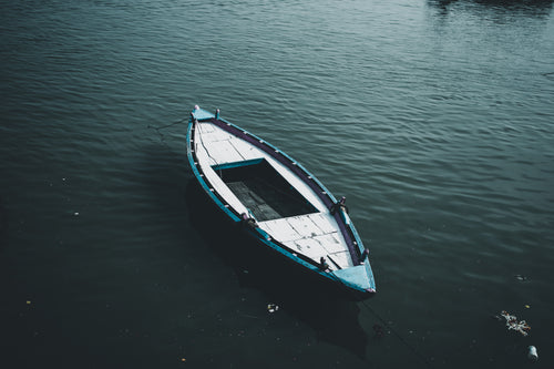 lone blue canoe
