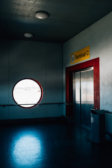 lonely elevator door with red