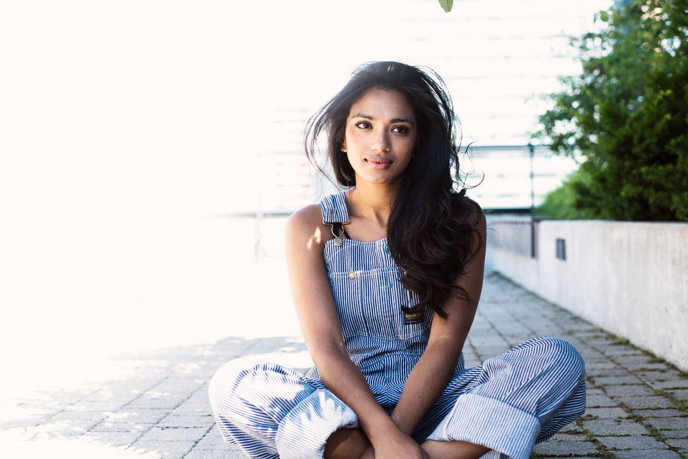 long brown hair and overalls