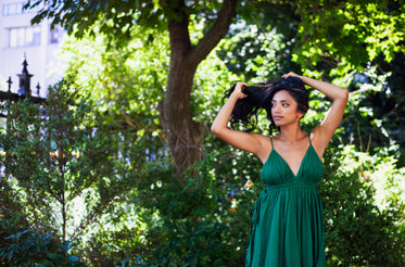 long dark hair and green dress fashion