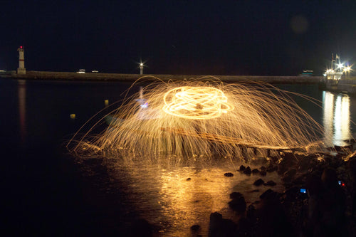 long exposure of fireworks exploding at night