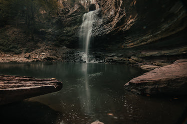 long exposure water fall near rockface