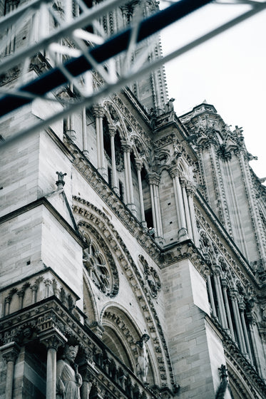 look up to the exterior of a carved building