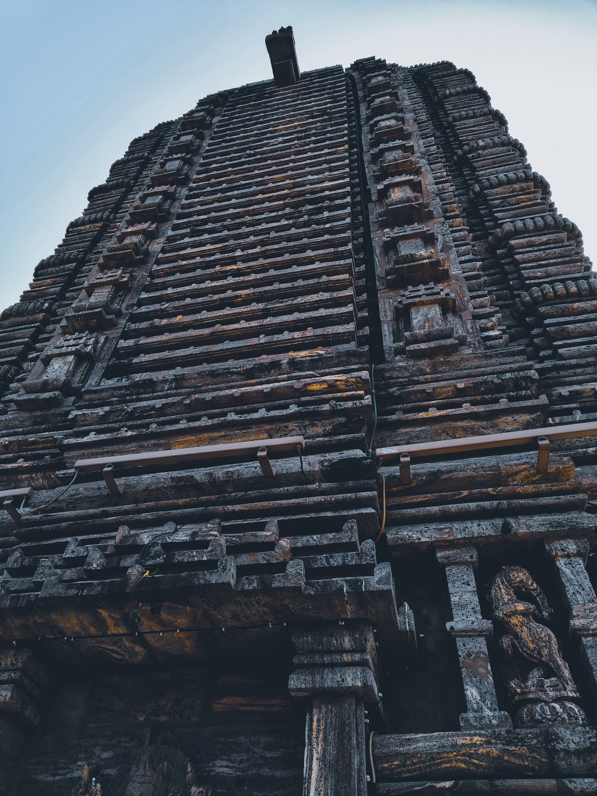 looking up at a tall temple