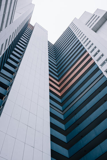 looking up at modern city building