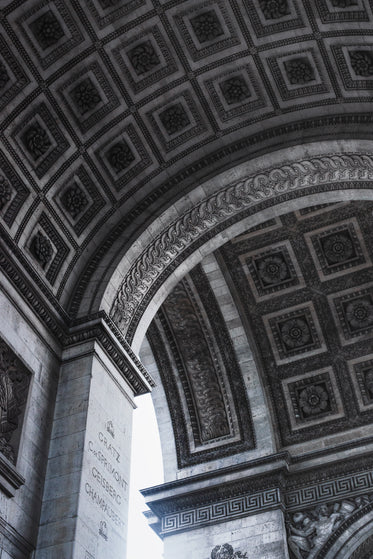 looking up at the arc du triomphe