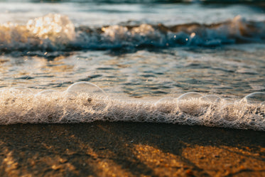 macro photo of bubbles on a sandy beach