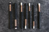 makeup brushes in a line