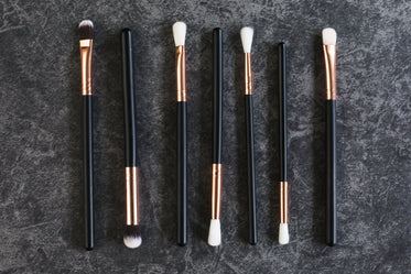 makeup brushes in a line