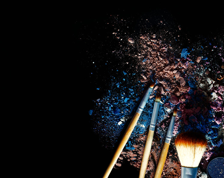 Makeup Brushes With Nude And Blue Powders