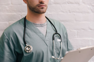 male doctor with stethoscope and clipboard