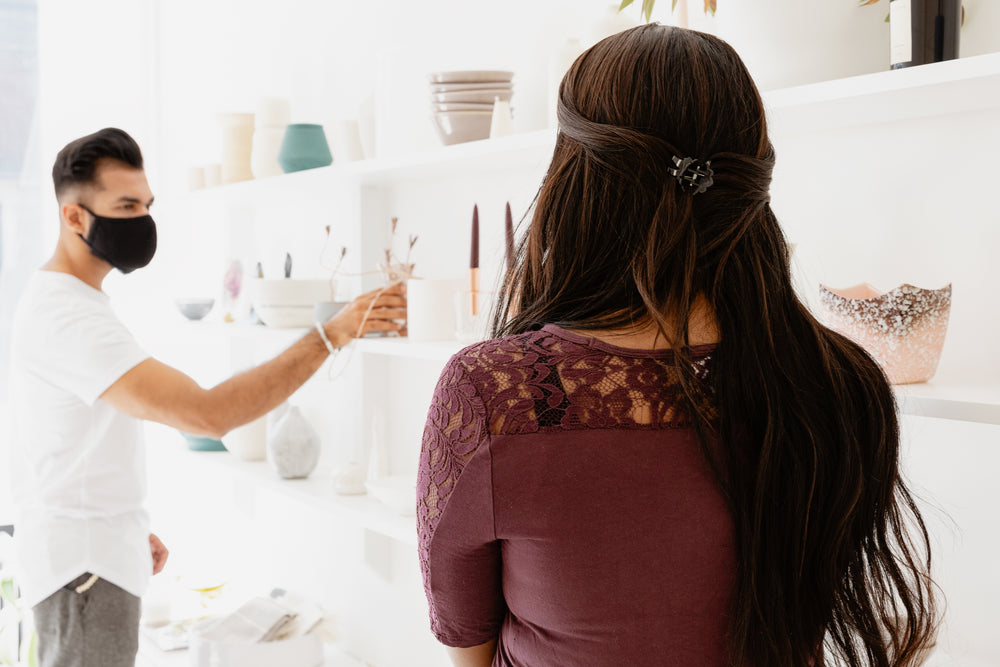 man and woman shop for home decor pieces