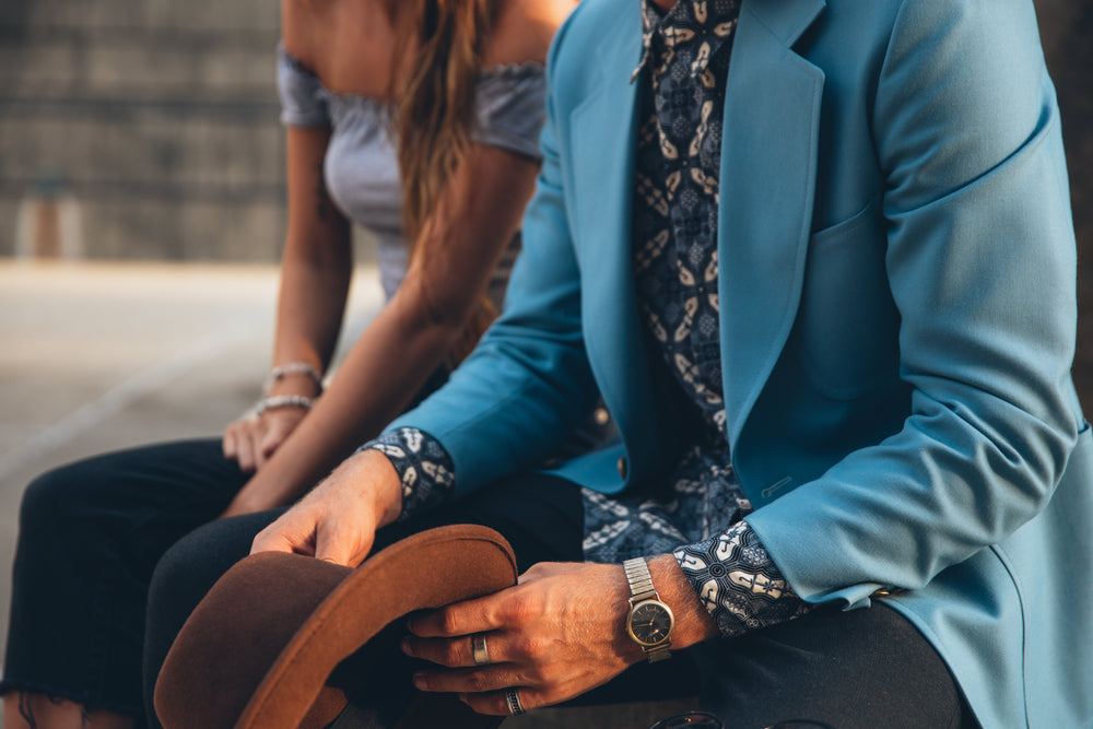 man and woman sit together