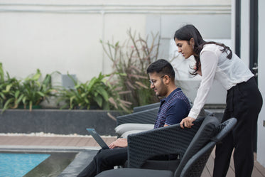 man and woman working outside