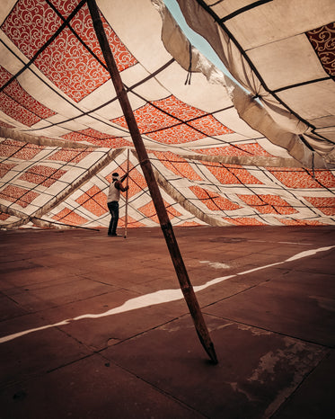 man constructing a canopy