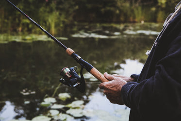 man fishing at lake