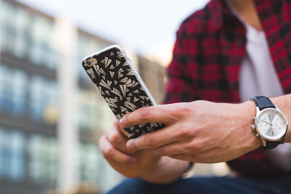 man hand holding iphone