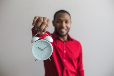 Free Man Holding Clock Forward Image: Stunning Photography