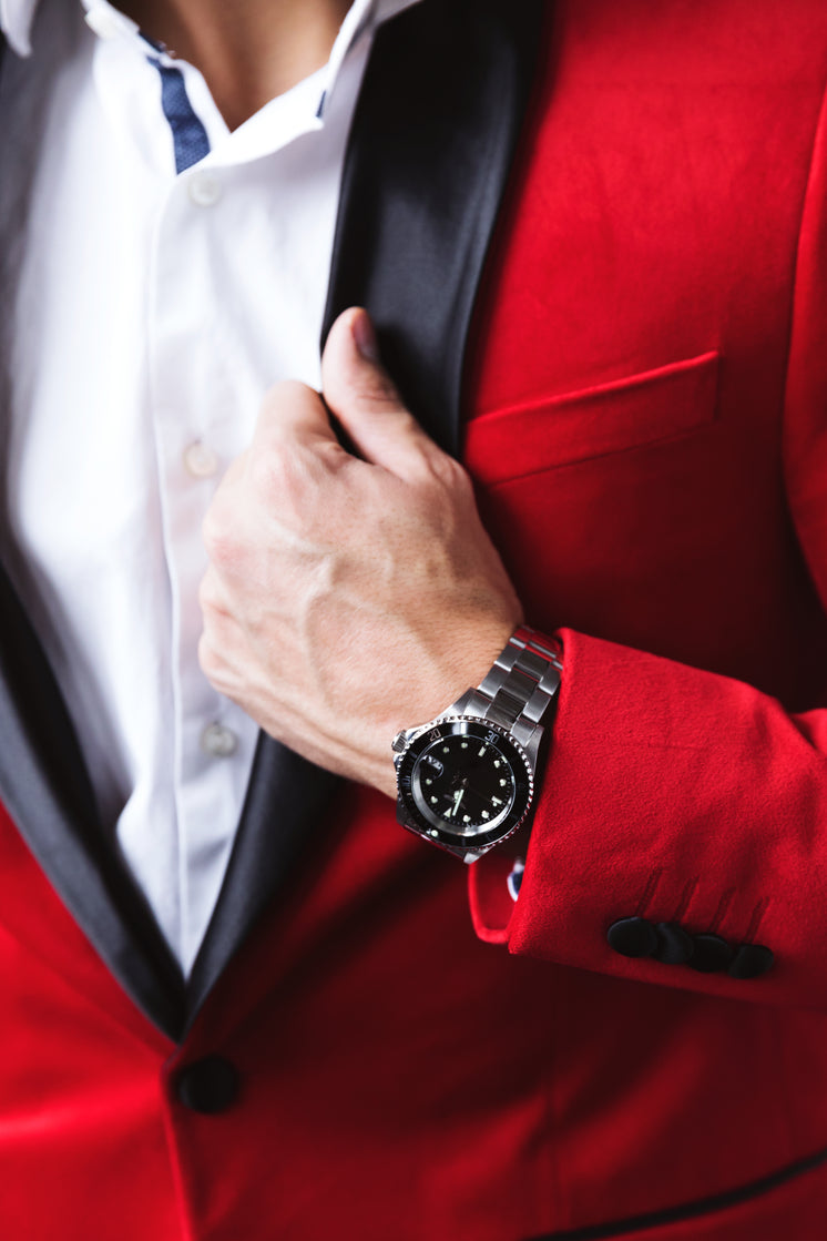man-in-red-tuxedo-with-top-button-undone