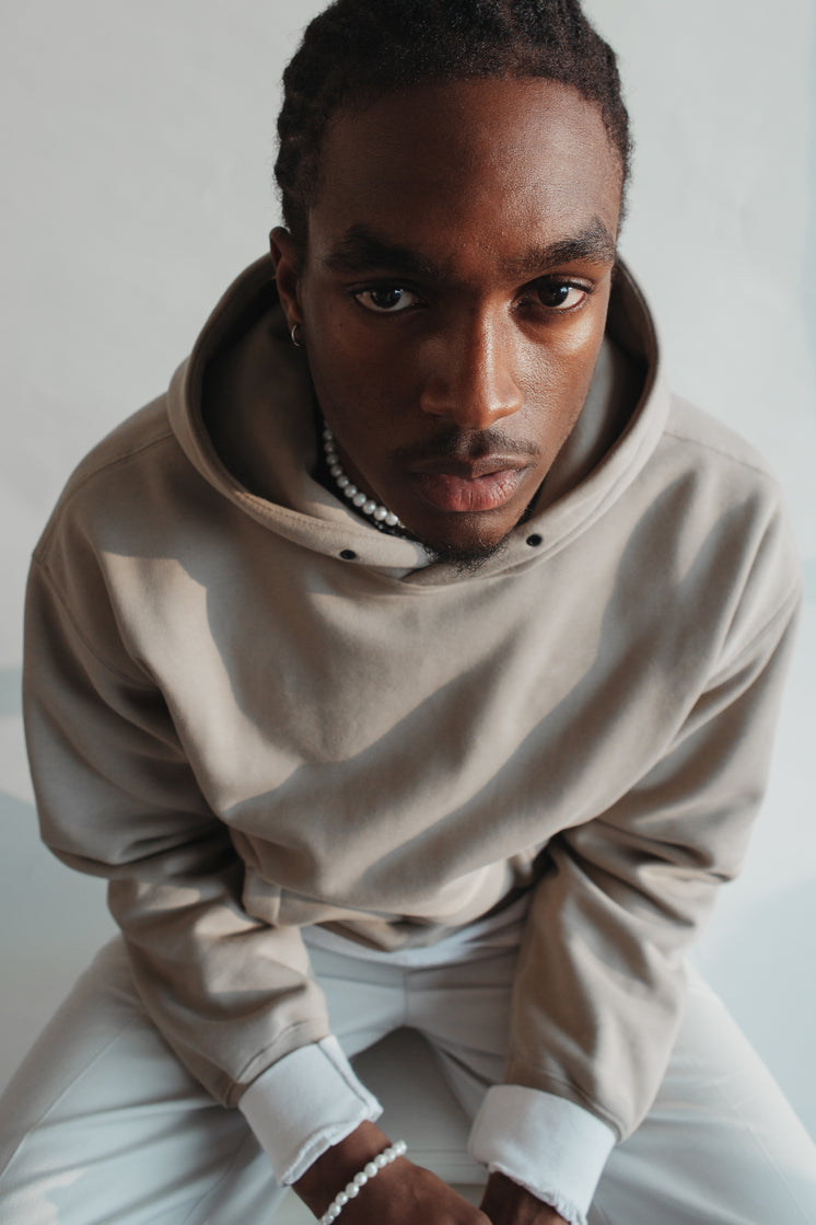 man-in-tan-hoodie-looks-up-at-camera.jpg?width=746&format=pjpg&exif=0&iptc=0