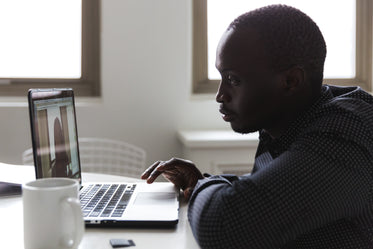 man in video meeting