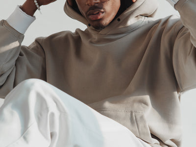 Man In White And Light Tan Outfit