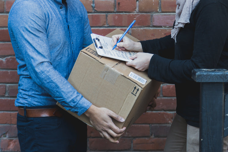 Man Signing For Shipping Box