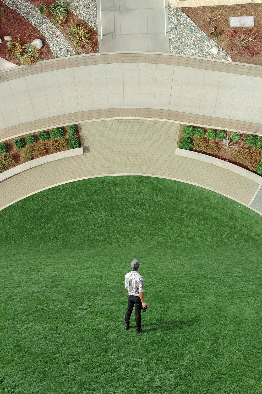 man stood in garden with vertical landscape ahead