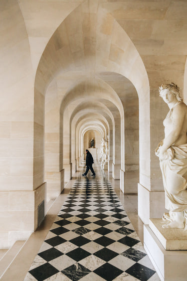 man walks across hallway