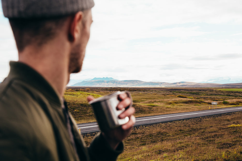 man watching the road landscape