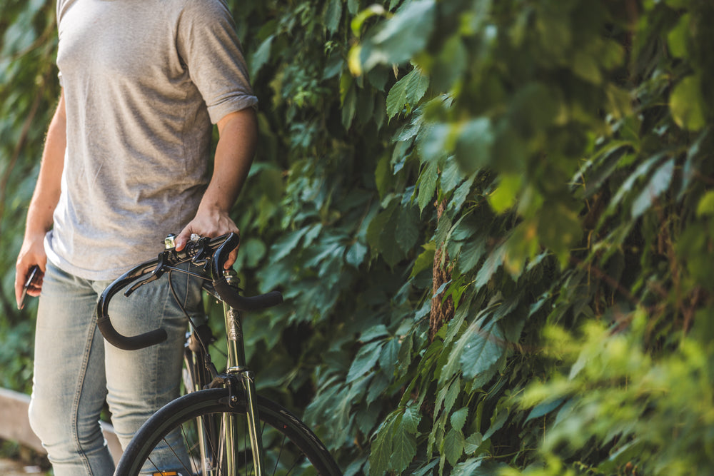 man with bike outside