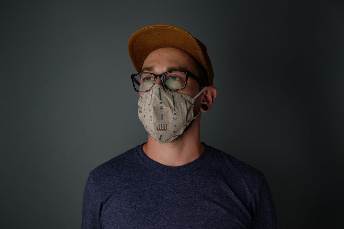 man with glasses and face mask