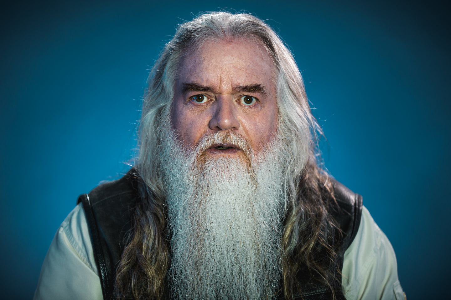 Man With White Beard Stunned