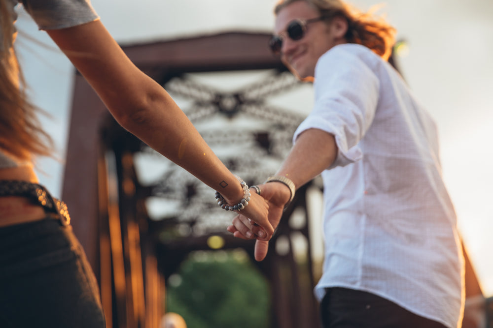 man & woman hand holding