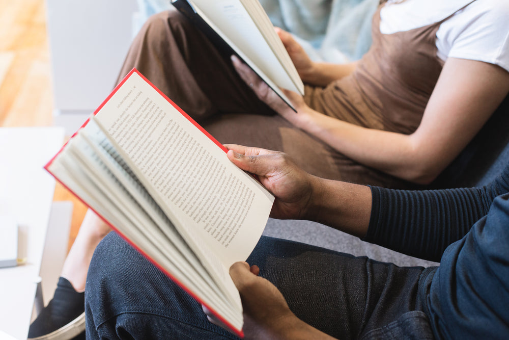 man & woman reading