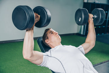 man working out with weights