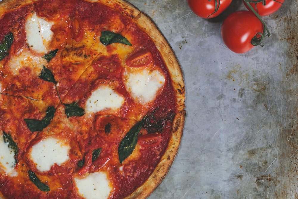 margarita pizza and fresh tomatos