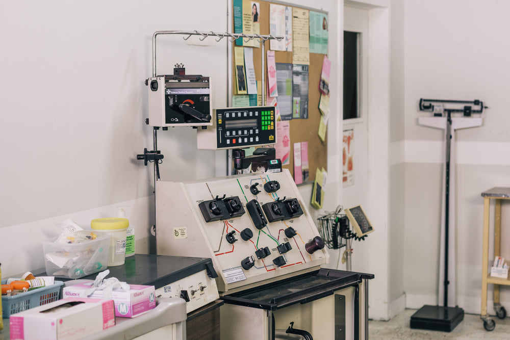 medical monitoring machine and supplies in hospital hallway