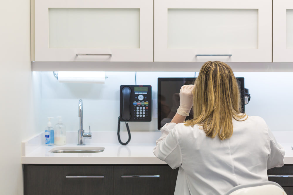 medical staff at computer