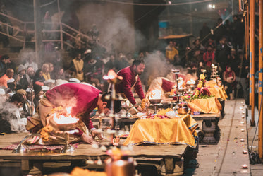 men bow on long tables