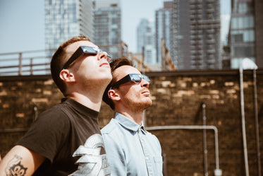 men look at sun