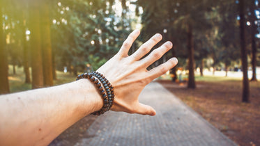 mens hand in park