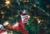 merry christmas ornament on tree