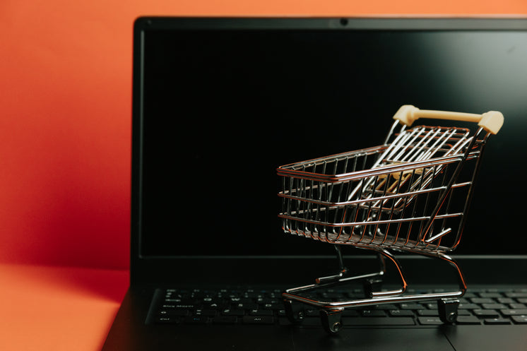 miniature-shopping-cart-on-a-laptop-keyb