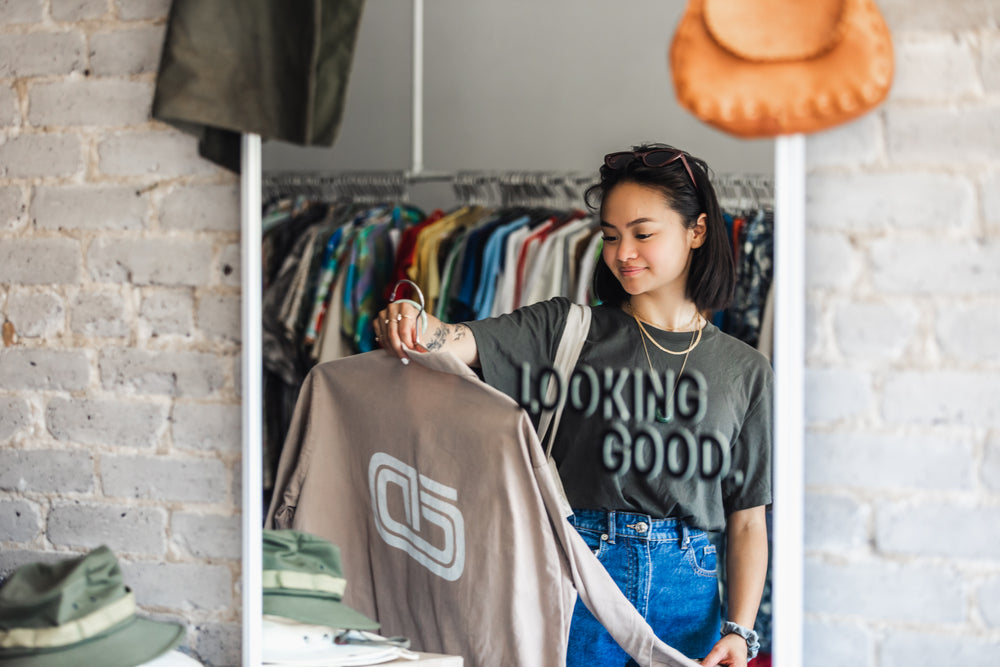 mirror view of young shopper