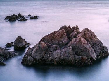 Misty Water Around Rocks